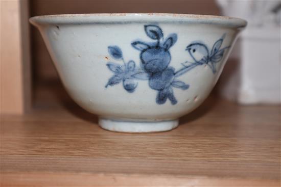 A pair of blanc de chine shi shi and blue and white bowl height 9cm